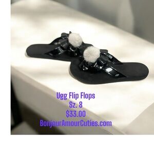 UGG Black Flip Flops with Pom Poms